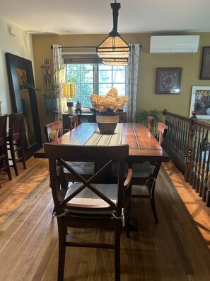 Farmhouse table seats 6 or more.