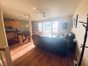 Living area with remote loungers and Smart TV