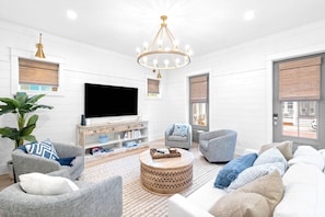 Beautiful living room with ample seating and a smart tv- perfect for watching movies at night!