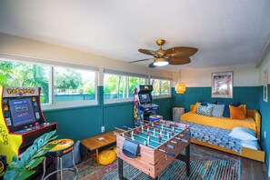 Multi-functional lively game room to a cozy bedroom retreat
