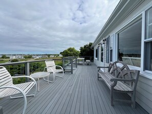 The expansive deck is perfect for relaxing or entertaining.