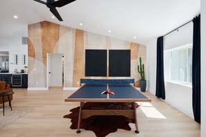 Ping-Pong table for friendly competition and entertainment in the great room.