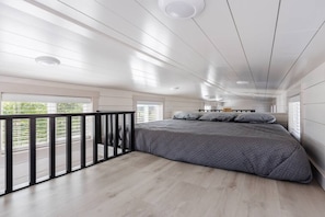 Enjoy a restful night on a comfortable King-sized bed with soft, crisp linens. The plush mattress provides the perfect balance of support and comfort, ensuring you wake up feeling refreshed and ready to take on the day.