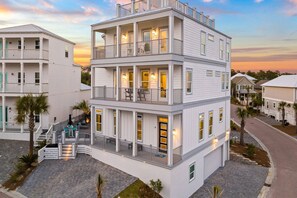 Massive roof top deck, with pergola, seating, fire pit, corn hole, and views for days!! Parking for 3-4 in the 2 driveways!