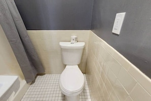 Recently renovated bathroom with stand-up shower.