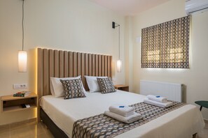 Modern bedroom with king-size bed and anatomic mattress.