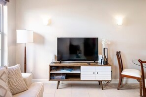  Check out this chic living room, perfect for movie nights or relaxing with friends.