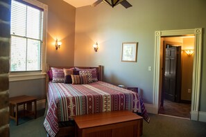 Queen bed + colorful linens