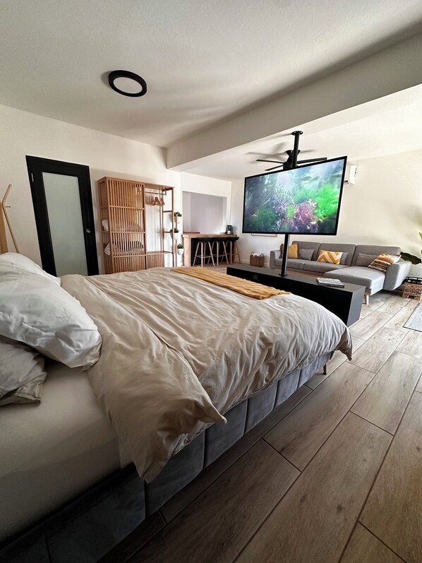This studio suite has combined sleeping arrangements with living room.