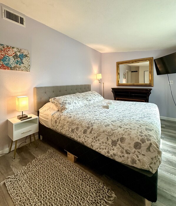 Masters bedroom: King size bed, TV, closet & has a direct access to the backyard