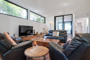 The lounge area opens straight to the deck.
