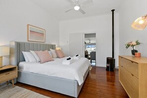 Cosy up in the second bedroom, with a heater and ceiling fan to keep temperatures comfortable no matter then season.