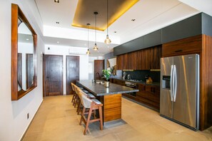 The elegant kitchen is well-equipped