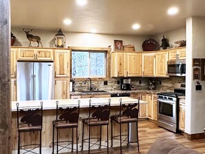 Large, generously equipped kitchen - everything necessary to easily create meals on-site, including a large spice/seasoning selection, cooking oils, quality cookware, condiment assortment, coffee selection with cream and sweeteners, etc.