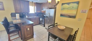 Indoors, Floor, Dining Table, Furniture, Table