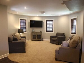 DOWNSTAIRS lounge area with TV