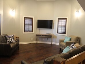 UPSTAIRS lounge area with television