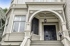  The main door at the top of a flight of stairs