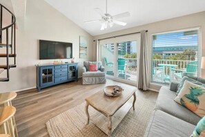 Large windows display the natural light and spacious balcony. 
