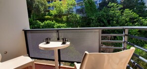 Lovely quite balcony for a morning coffee and evening beverage. 