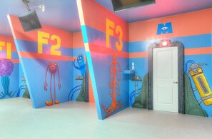 This fun and custom built game room has VR arcade headsets, multi-cade arcades with thousands of classic games