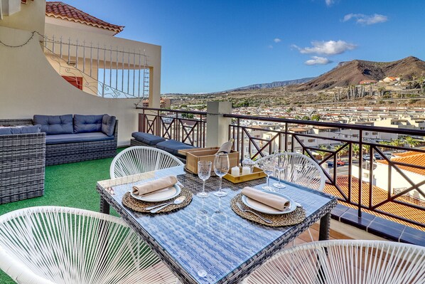 Terrace with outside dining&sitting area w/mountain view