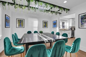 Our dining room with 12 chairs is perfect for family celebrations! Ideal for big meals and great conversations! 
