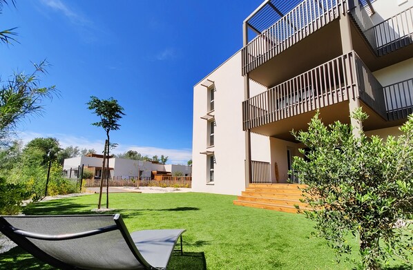 Private garden with shaded terrace, garden furniture, barbecue and petanque area
