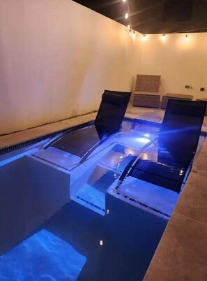 Cozy pool with dimmed lighting for nights