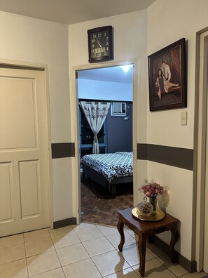 Bedroom for two with AC. Open glass window for fresh air especially at night.