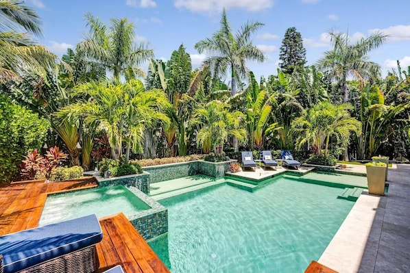 Enjoy the tranquility of the private Tropical Oasis pool and spa.