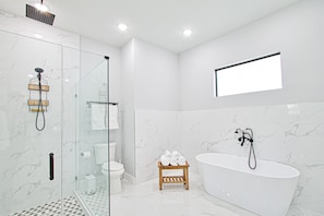 Master bathroom with Shower and Bathtub
