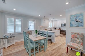 Dining Area - table sits 6 plus 3 barstools for the kitchen island