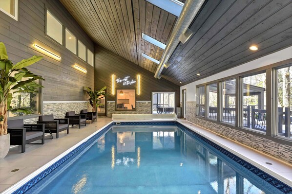 Bask in the warm glow of our indoor heated pool, where luxury meets leisure beneath a canopy of natural light.