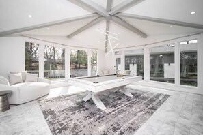 Stylish Billiards Room with Natural Light & Modern Decor