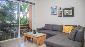 Living Room with Smart TV + Patio