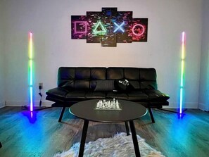 Our game room features a new leather futon for additional sleeping space 
