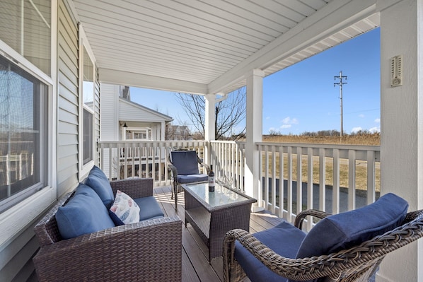 Back porch of the Shore Thing, overlooking the 6th hole of Harbor Shores