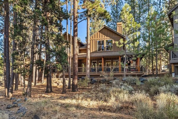 Surrounded by towering pines, this stunning lodge-style home offers the perfect escape into nature while being just minutes from Bend's vibrant downtown