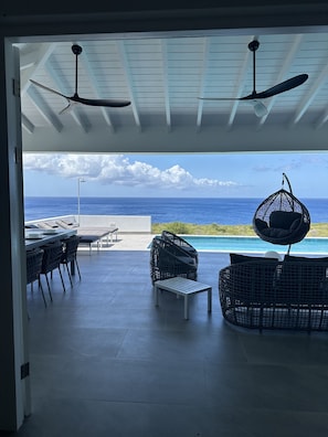  Ocean breeze throughout the villa, two large fans,Watch sunrise/Sunsets 