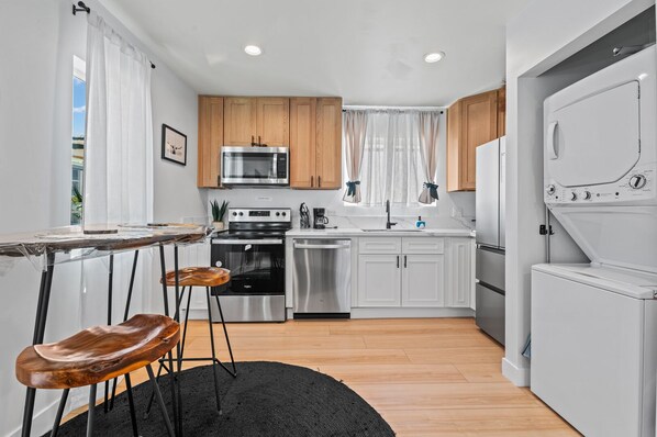 Brand new home, full kitchen, stocked with basic cookware for simple stay.