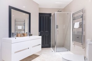 Large bathroom with shower and jacuzzi