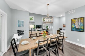Savor your meals in style at our long dining table that can seat up to 10.
