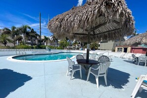 Take a Swim or Relax in the Sade by the Heated Resort Pool