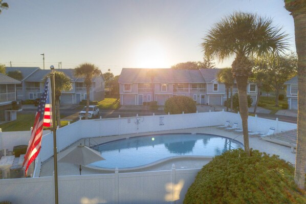 Cool down after a day at the beach and relax by the community pool at Sun Ketch