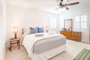 A serene bedroom retreat, where simplicity meets comfort.