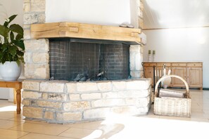 There is a fireplace in the apartment