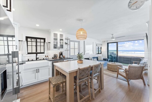 The open concept floor plan connects the living space and kitchen area seamlessly.
