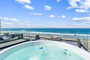 Enjoy private hot tubs, rooftop views, and direct boardwalk access at our luxury 2nd floor units in Mission Beach.