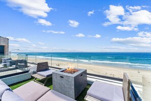 You'll have full access to the rooftop lounge area with plenty of soft, comfortable outdoor furniture.